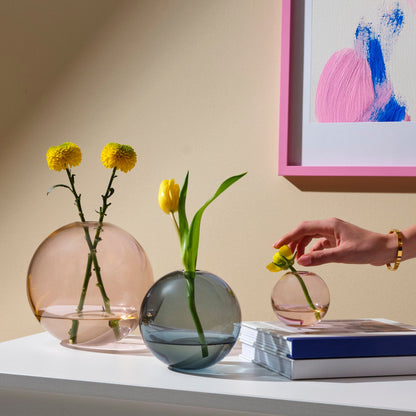 Lifestyle view of Mars Vase Small Steel Apricot Barware | Provenance & Patina