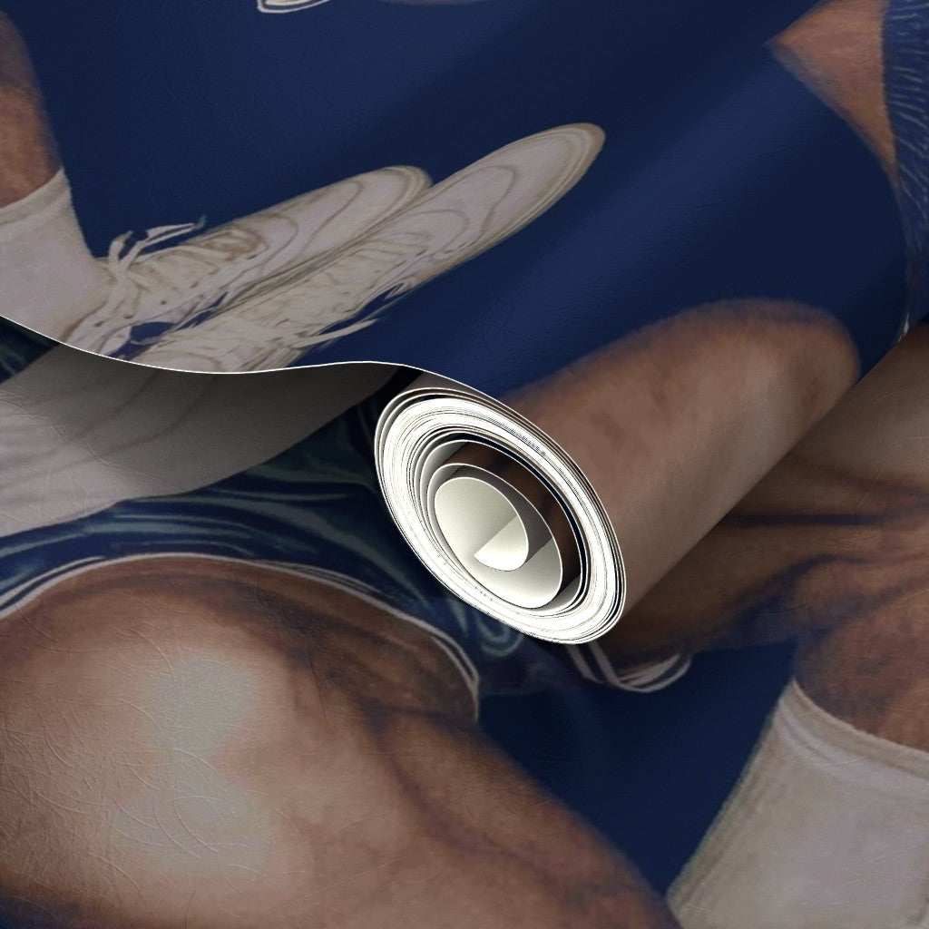 Detail of the metallic pearlescent finish on the athletic motif wallpaper.