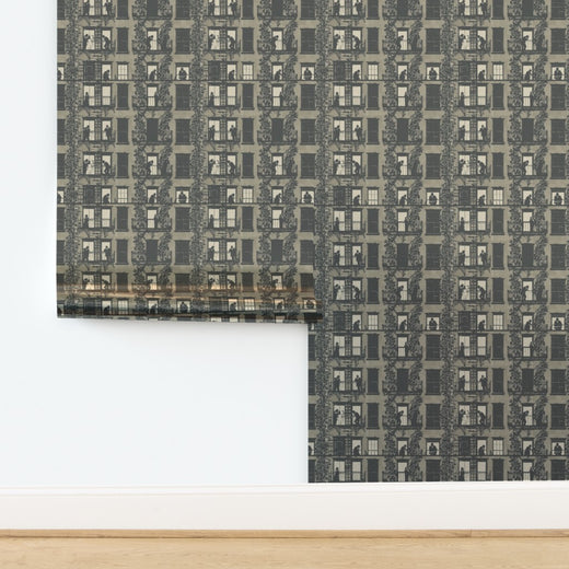 Soft metallic shimmer on the neutral Greige designer wallpaper.
