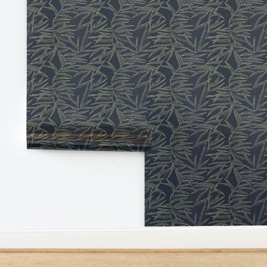 Luminous metallic finish on the earthy bamboo pattern wallpaper.
