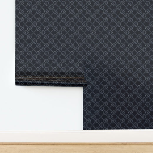 Luminous pearlescent metallic paper finish of the Carrick Knot wallpaper.