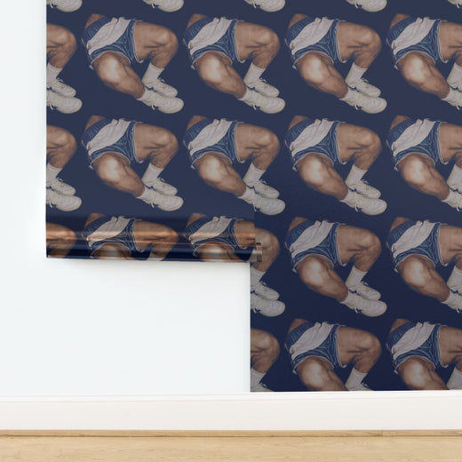 Luminous metallic wallpaper finish showing soft pearlescent reflection.