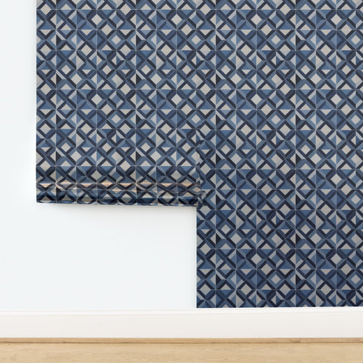 Ponti Geometric wallpaper in Sand with a soft metallic pearlescent finish