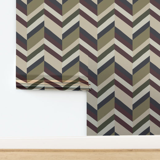 Modernist chevron pattern on metallic pearlescent wallpaper, highlighting its reflective, luminous quality.