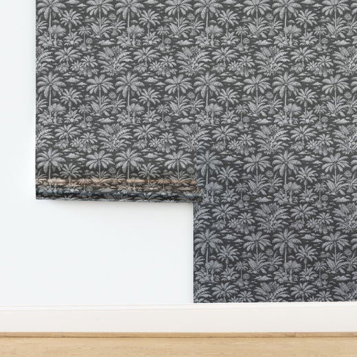 Reflective shimmer on Palmy Weather Charcoal metallic wallpaper.