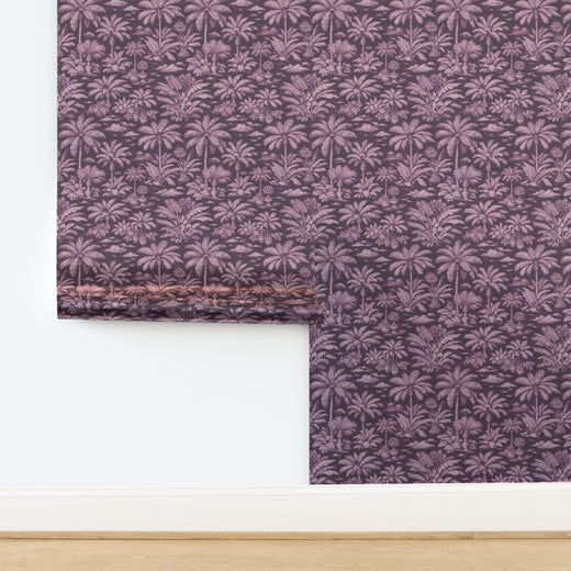 Reflective sheen on Palmy Weather Pink metallic wallpaper.