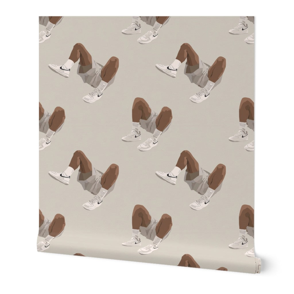 Non-pasted White Kicks wallpaper roll showing the athletic sneaker motif against a neutral taupe background.