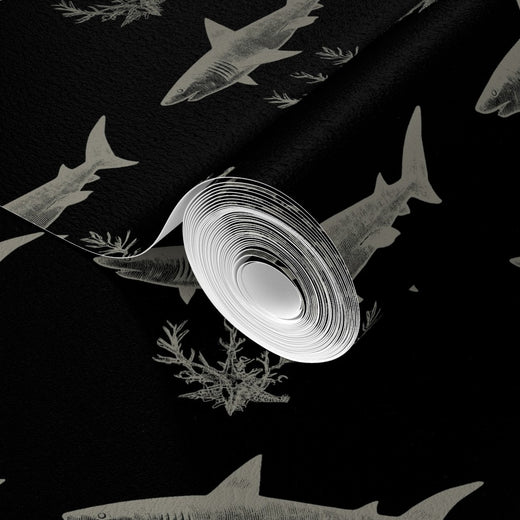 Angled swatch view of the Solo Swimmer non-pasted matte wallpaper in black and off-white.
