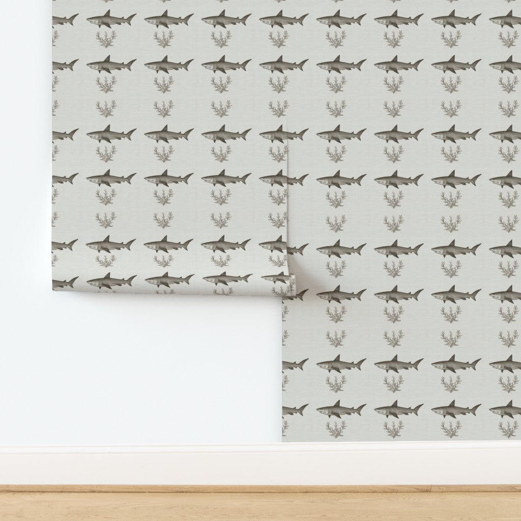Detailed close-up of the non-pasted Solo Swimmer shark pattern wallpaper in black and neutral tones.