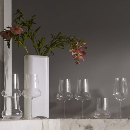 The Ghost Zero Belly white wine glass in a bright kitchen setting, catching natural light beautifully.