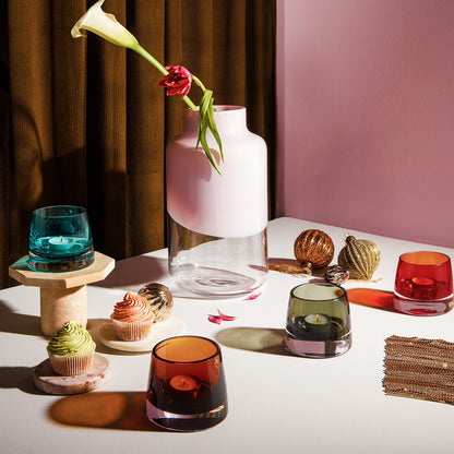 Studio display of the modern glass Magnolia vase showing its unique sculptural silhouette.