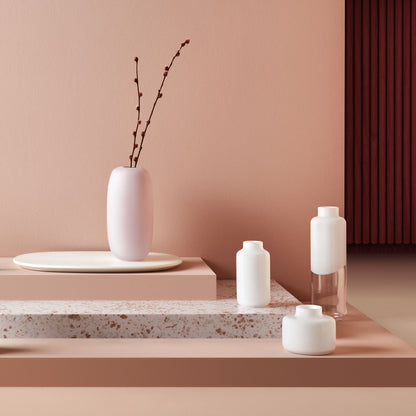 Detailed view of the crystalline glass base of the Mini Magnolia vase, showcasing its weighted design.