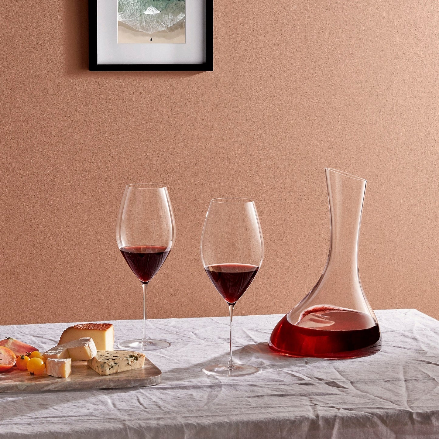 Two NUDE Glass Stem Zero Grace Red Wine Glasses side-by-side, showcasing their balanced proportions.