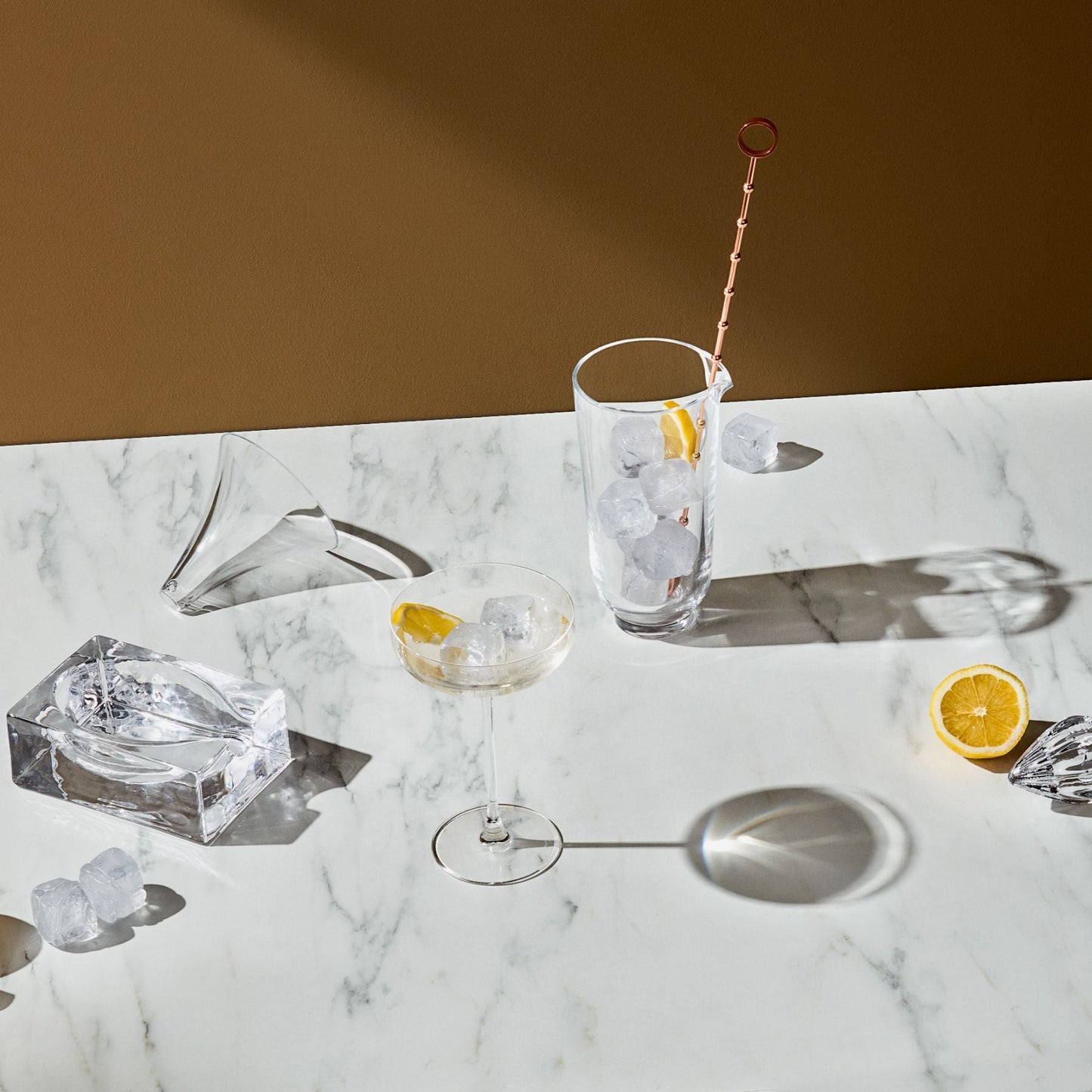 Clean profile of the minimalist crystalline glass funnel, ideal for modern interiors.
