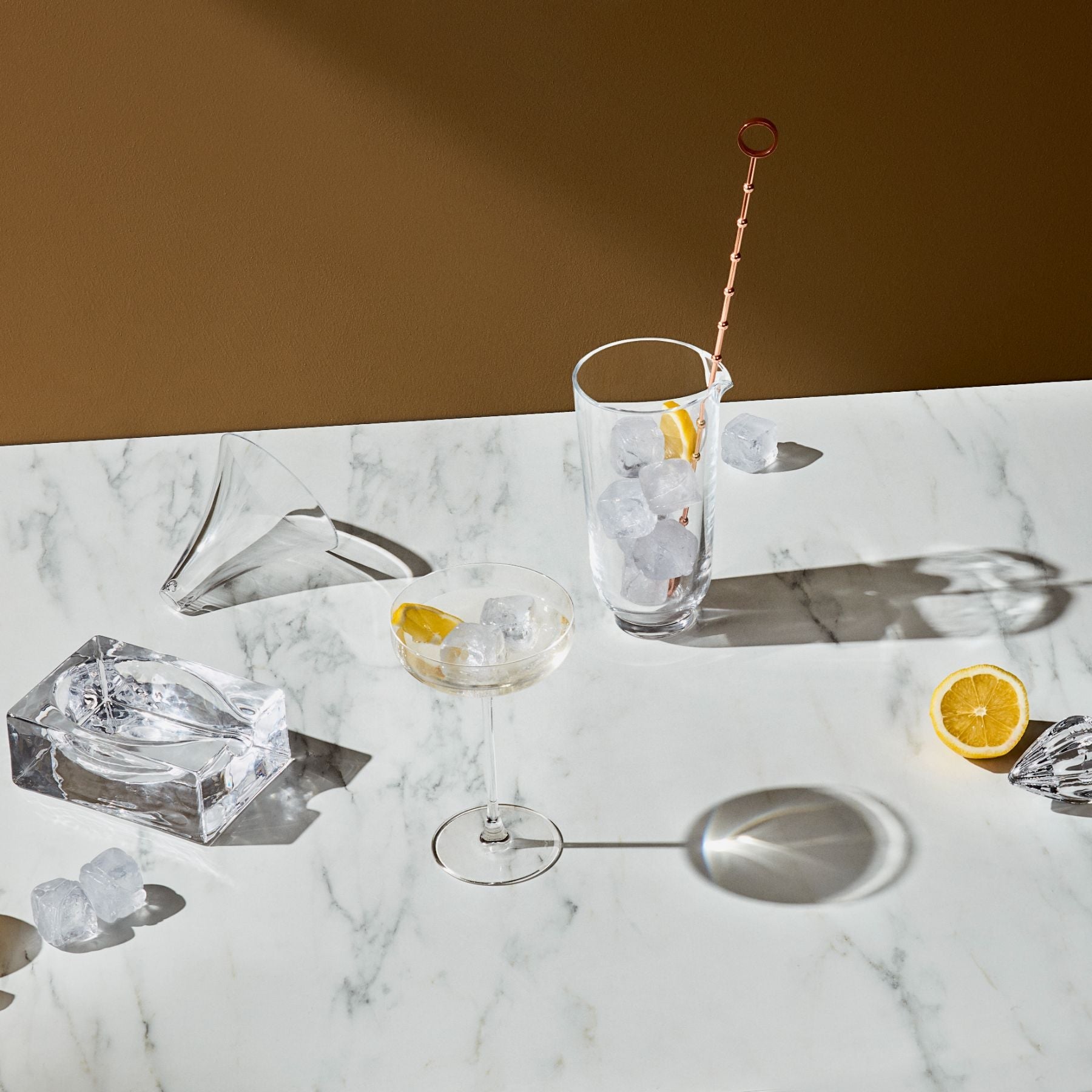 Detailed studio view of the clear glass citrus squeezer design