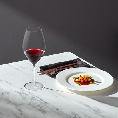 Sophisticated table setting featuring the modern and durable Stem Zero Grace Red Wine Glass.