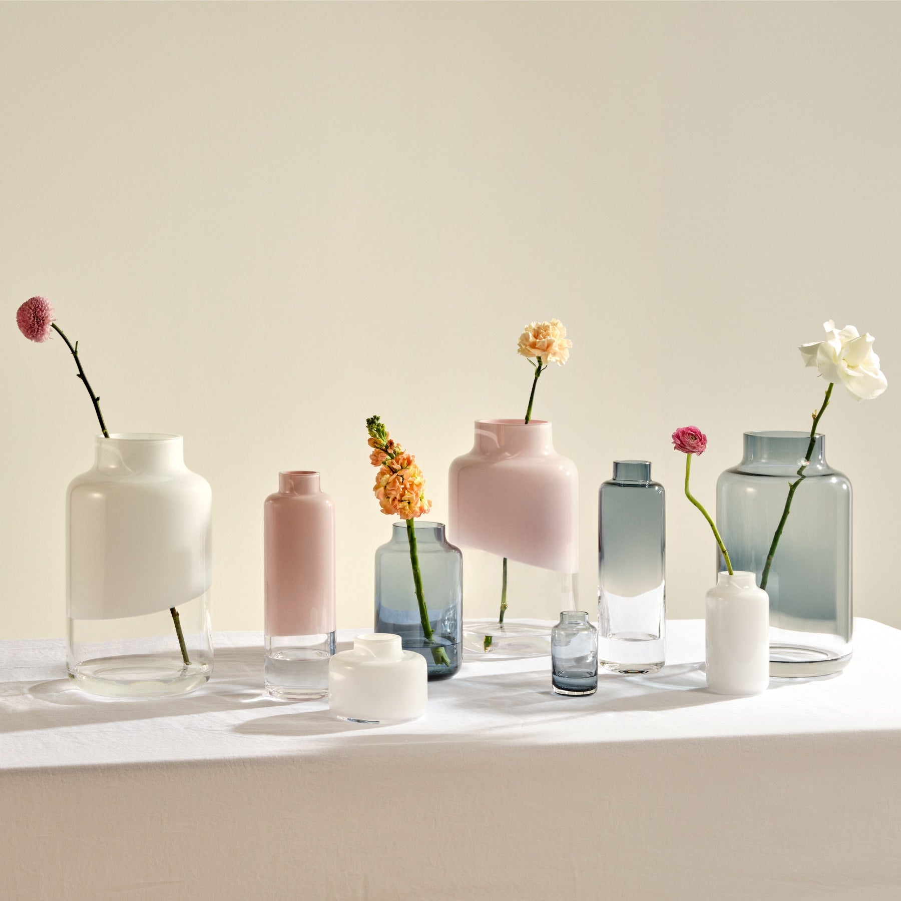 Detailed view of the smooth, hand-blown crystalline glass curves on the Magnolia vase.