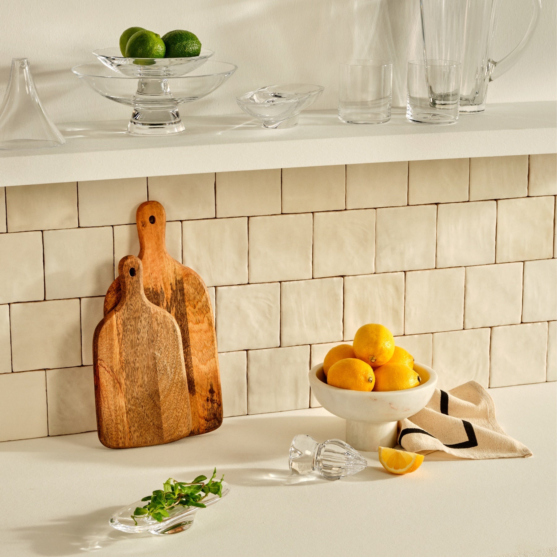 Modern clear glass kitchen funnel shown on a neutral background, highlighting its premium craftsmanship.