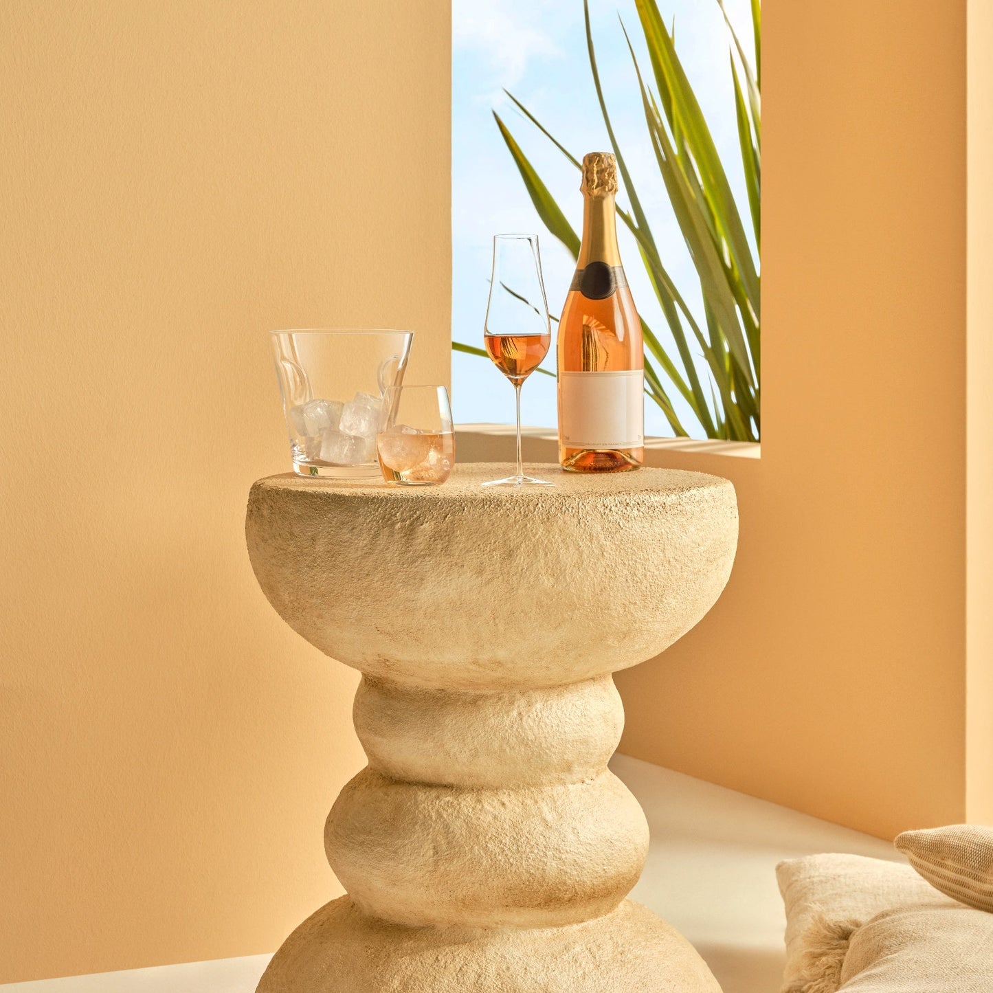 Sophisticated tabletop scene highlighting the NUDE Glass Pure Sweets & Spirits glass next to a dessert plate.