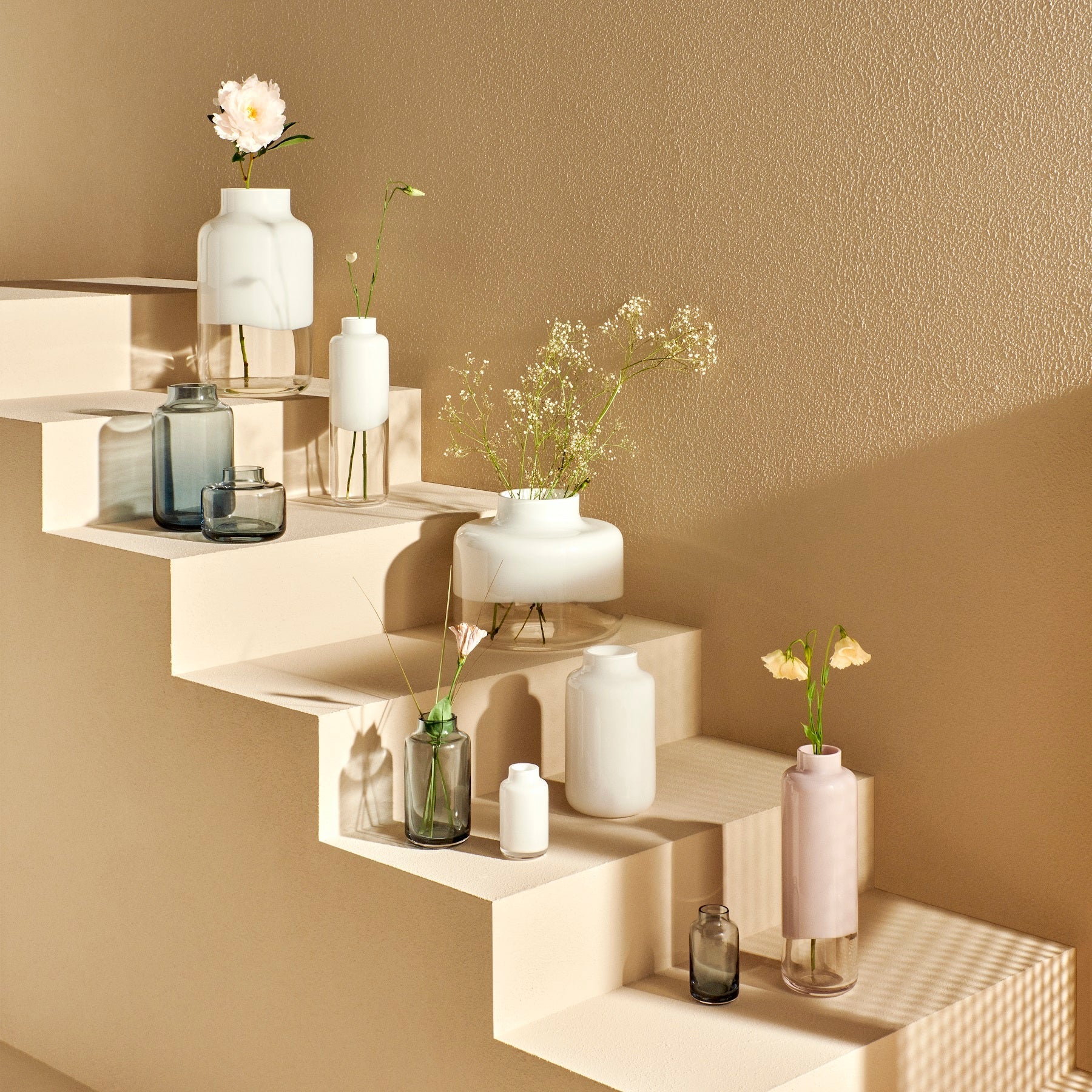 Stylized view of the NUDE Glass Magnolia vase highlighting its smooth rim and modern design.