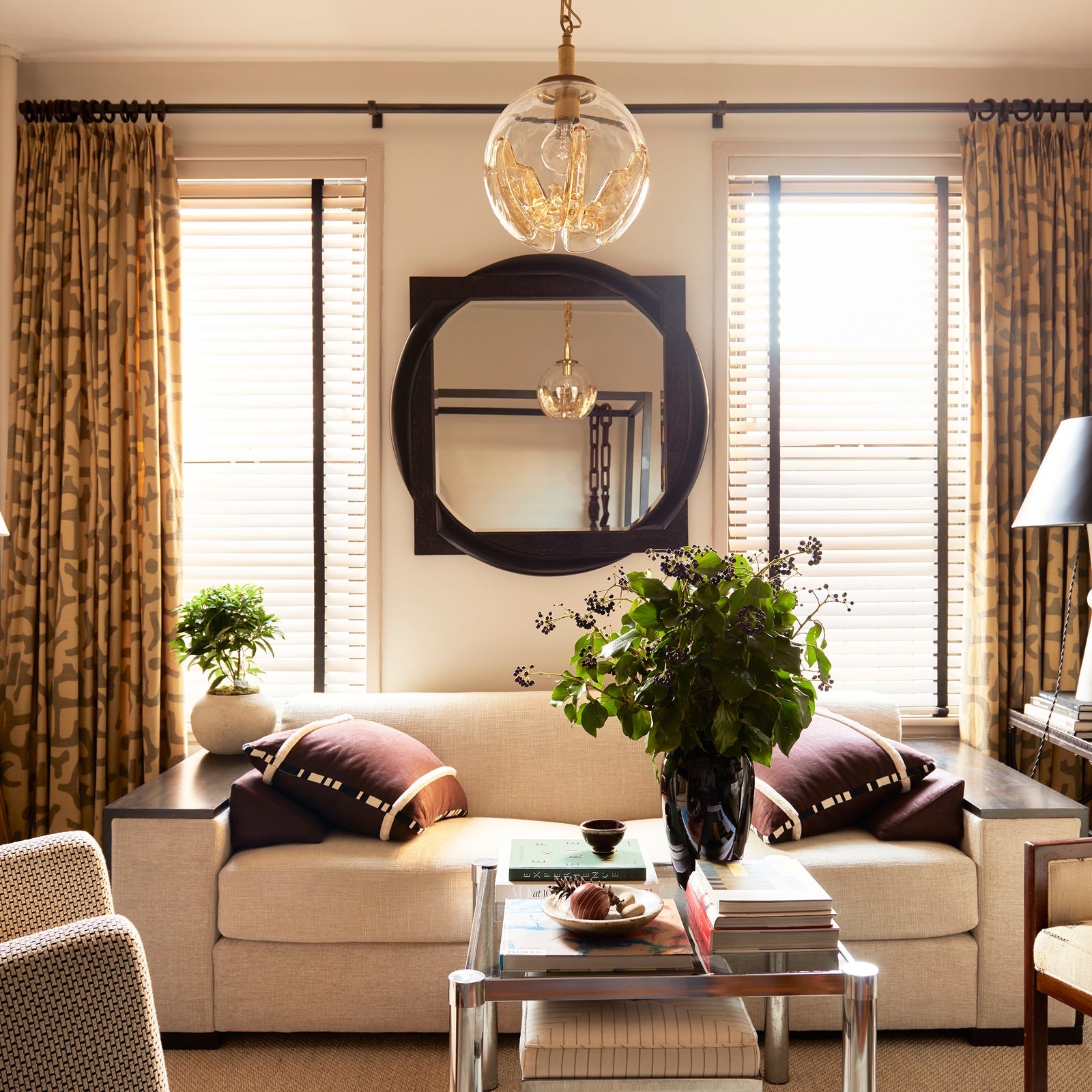 Detailed view of the Mazza Mirror grain and geometric wood frame