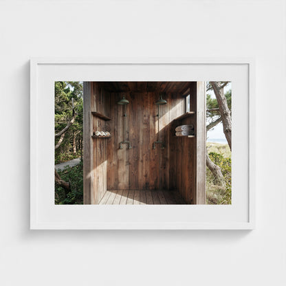 Pines Outdoor Shower framed art print in a 24x18 white landscape wooden frame on a minimalist wall.