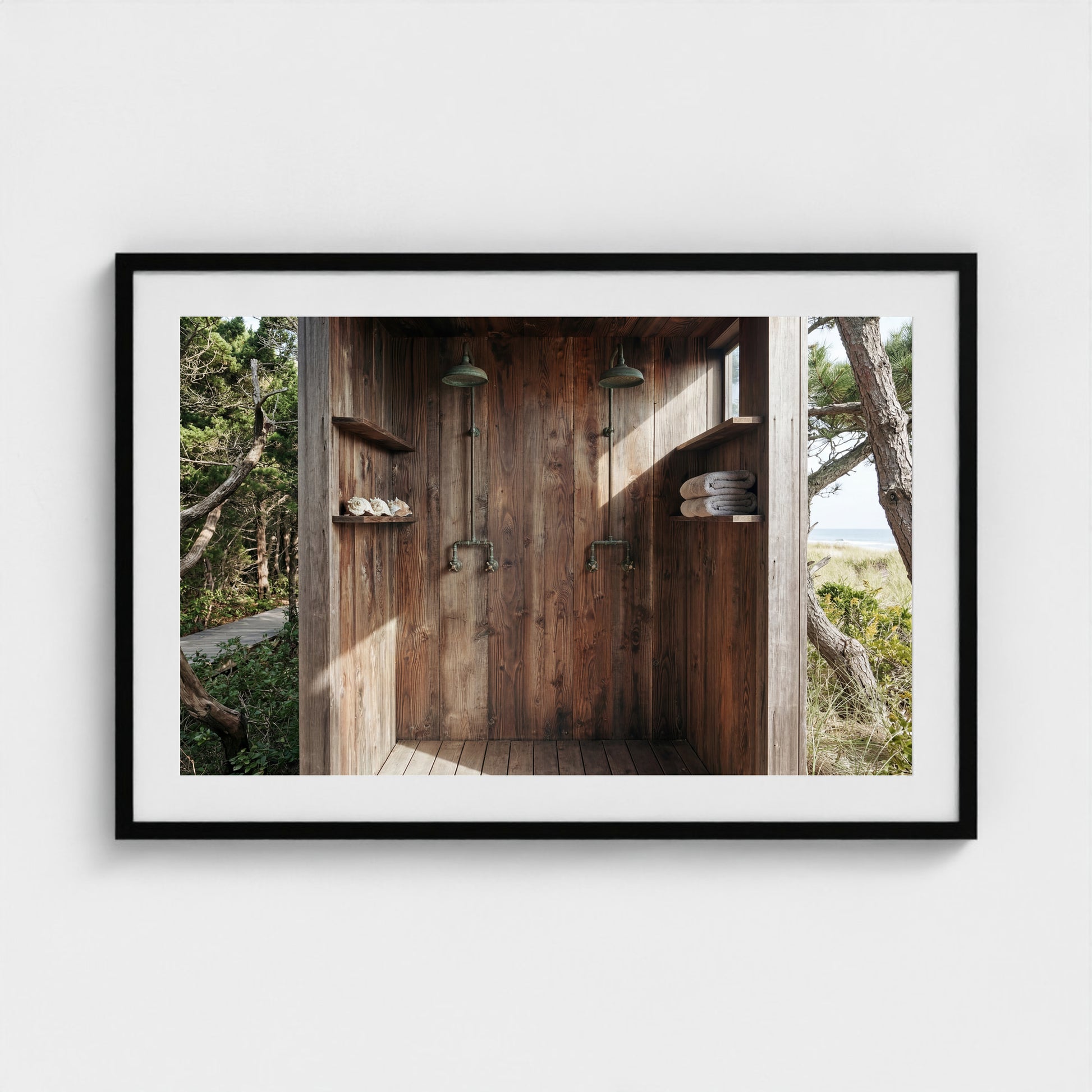 Pines Outdoor Shower framed art print in a 36x24 black landscape frame, styled in a modern interior.