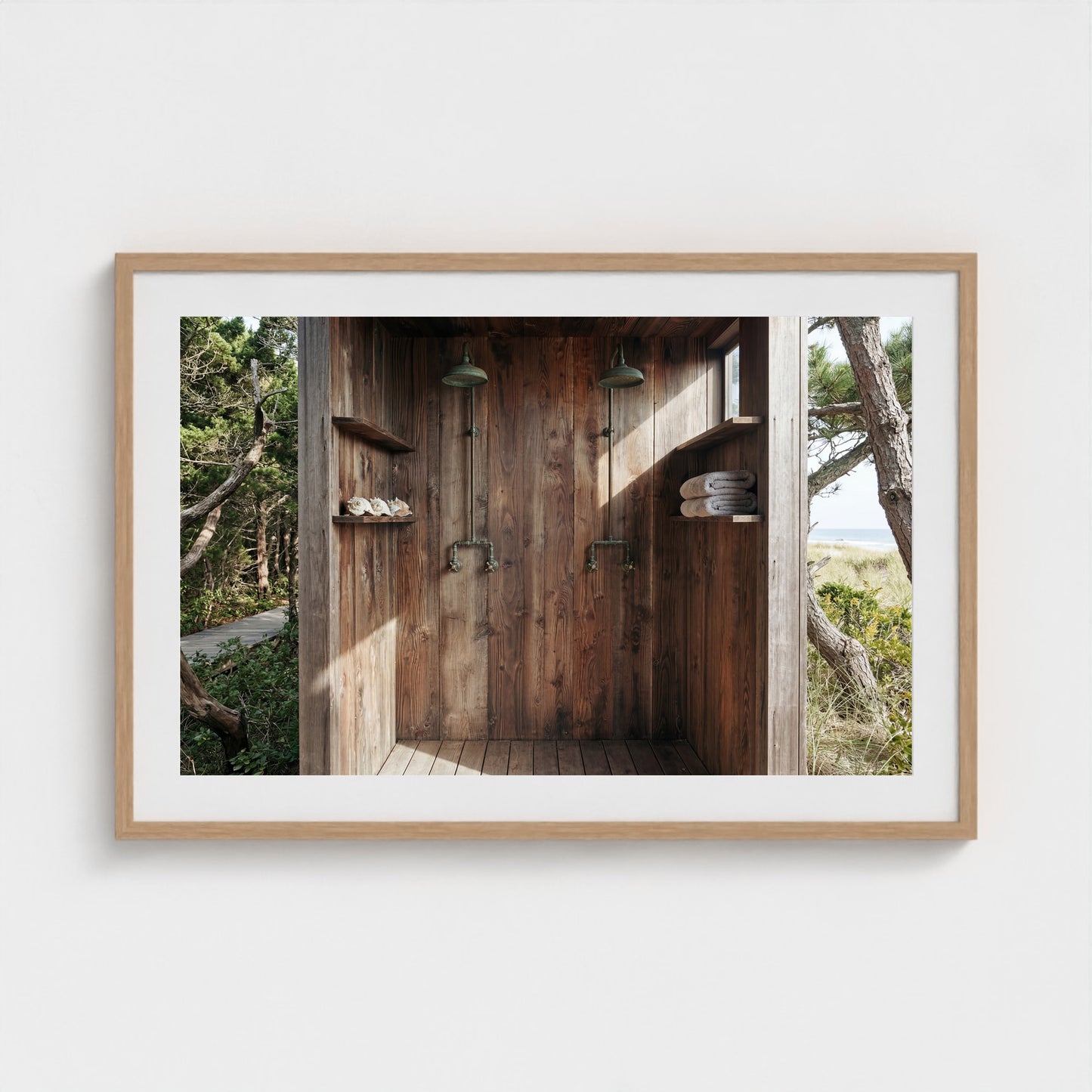 Pines Outdoor Shower framed art print in a 36x24 natural wood landscape frame hanging above a console.