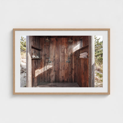 Pines Outdoor Shower coastal landscape print in 36x24 natural frame mockup