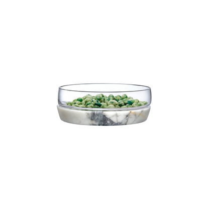 Large minimalist lead-free crystal bowl resting on a solid white marble base