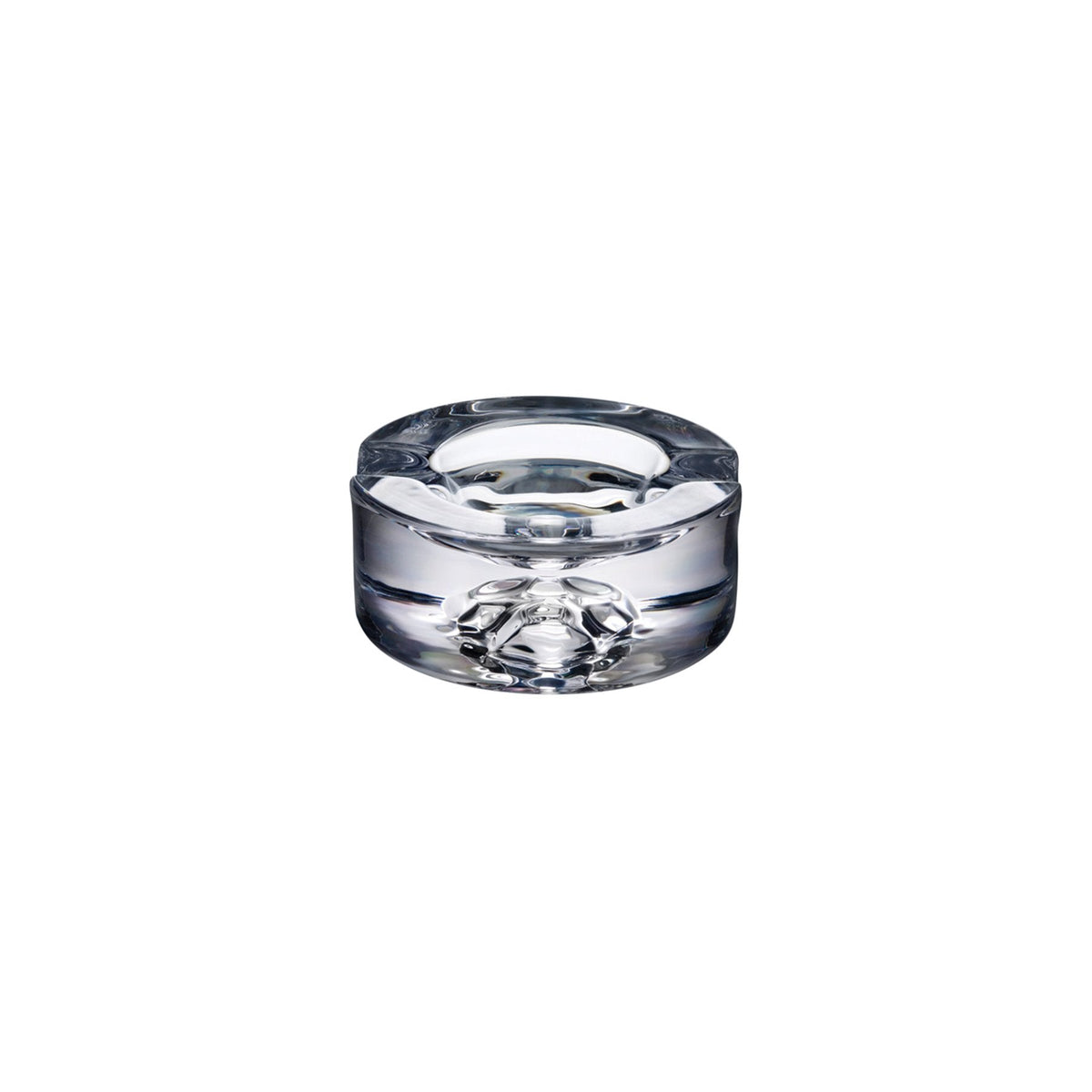 Minimalist NUDE Glass Shade crystal cigar ashtray with a thick, sculptural clear base.
