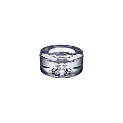 Minimalist NUDE Glass Shade crystal cigar ashtray with a thick, sculptural clear base.