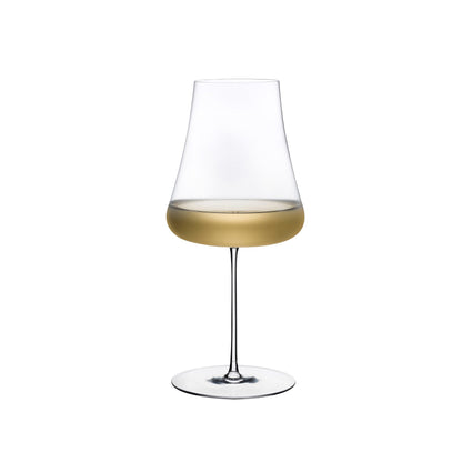NUDE Glass Stem Zero Volcano white wine glass showcasing its sleek silhouette and delicate stem against a white backdrop.