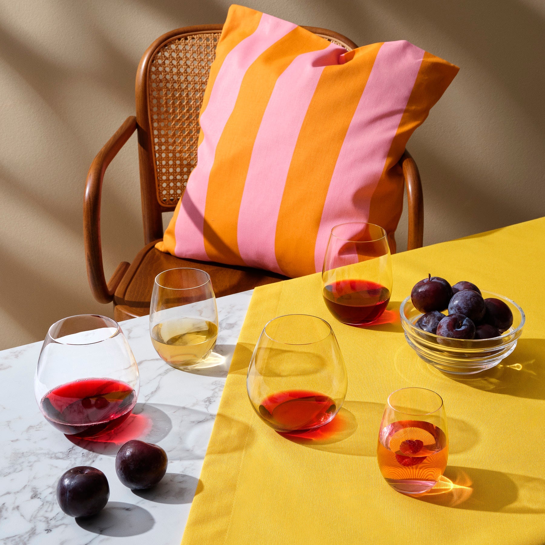 A selection of premium NUDE Glass stemware, including the Pure Bourgogne and Bordeaux crystal glasses.