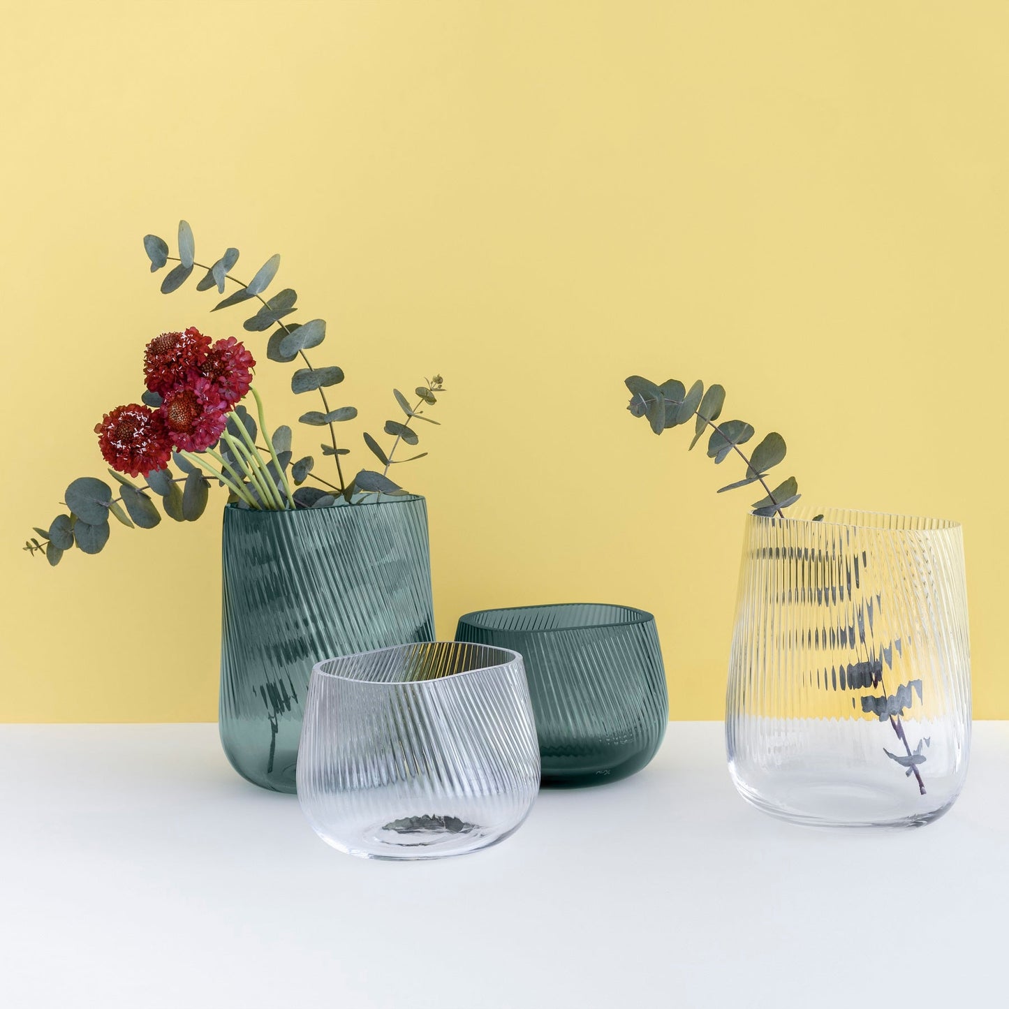Detailed view of the fine vertical pleating and brilliant clarity of the lead-free crystal vase