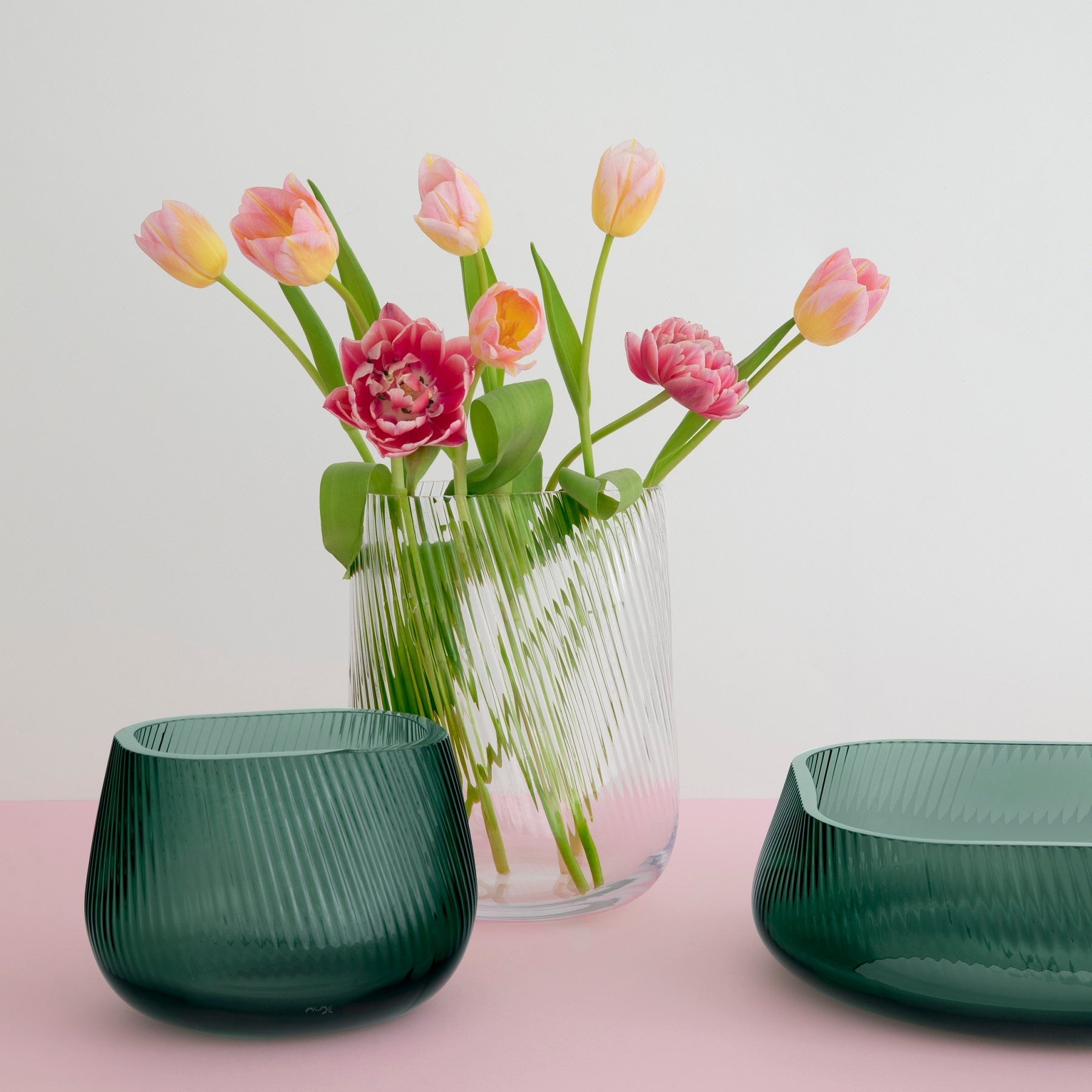 Elegant lifestyle arrangement with the textured NUDE Glass Opti crystal vase reflecting soft ambient light