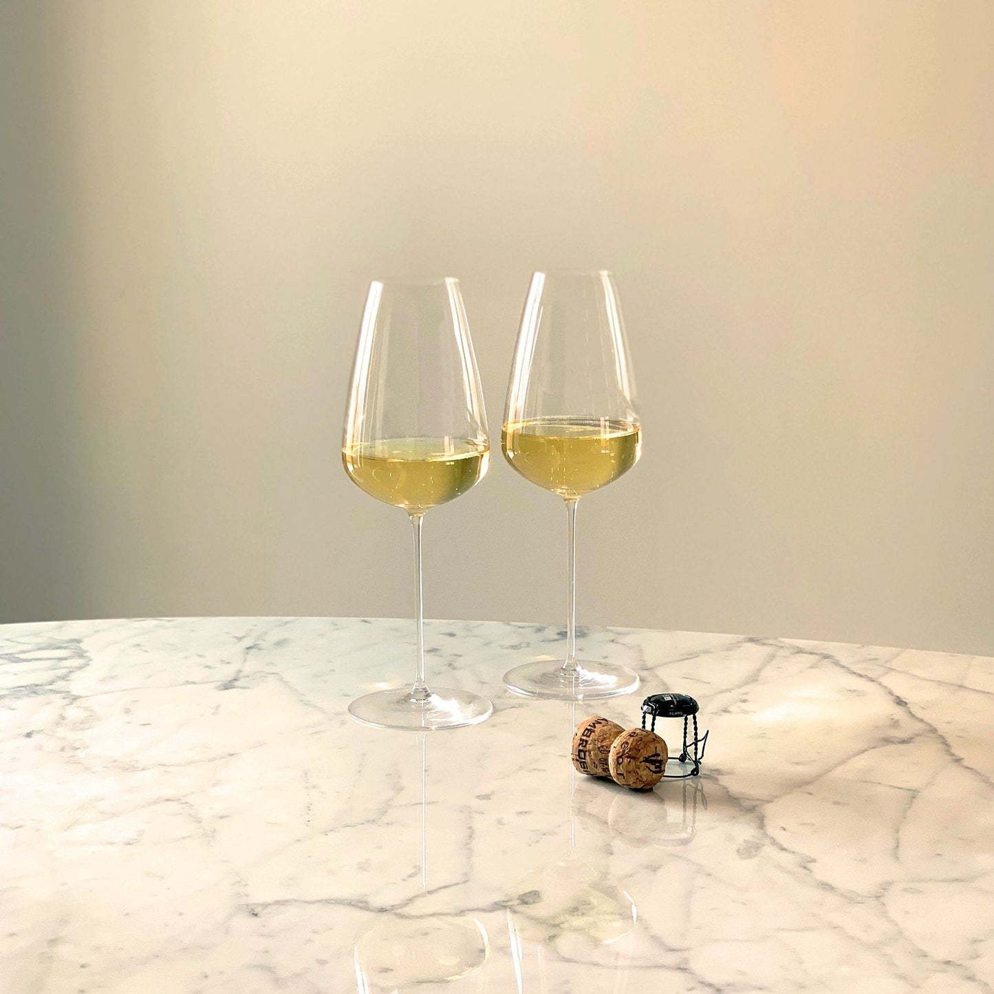 Close-up of the ultra-fine stem and base on the Stem Zero Champagne Grand Cru glass.
