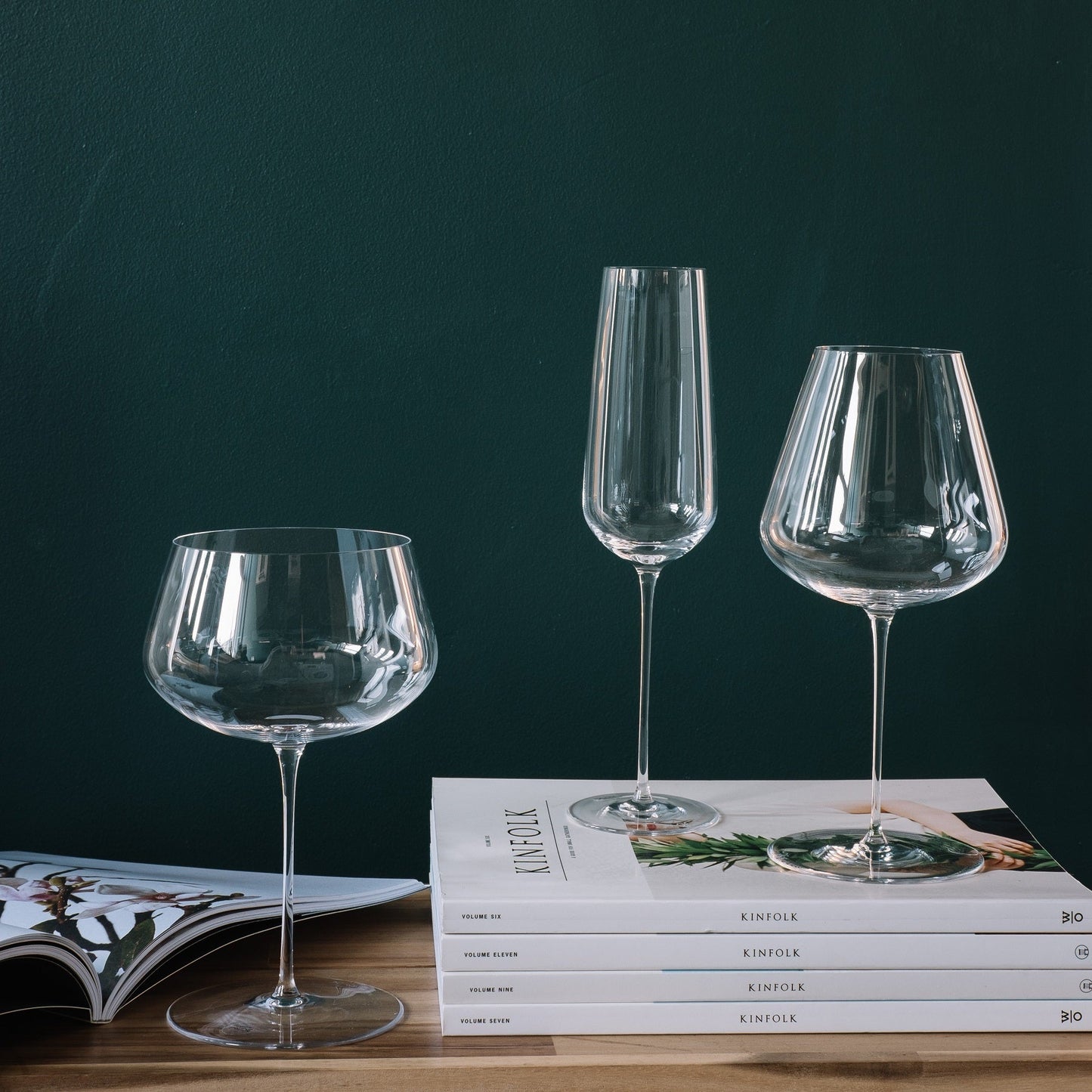 An elegant table setting featuring mixed glasses from the Stem Zero collection, showing diverse heights and shapes.