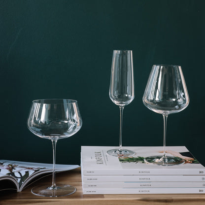 An elegant table setting featuring mixed glasses from the Stem Zero collection, showing diverse heights and shapes.