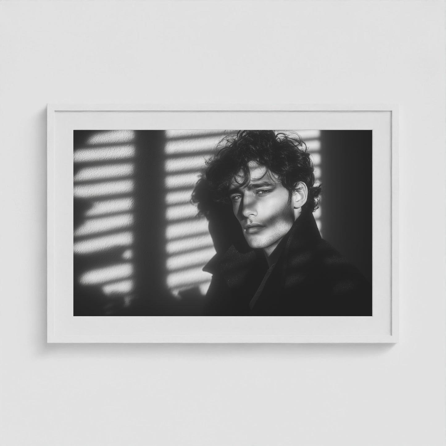 Framed black-and-white male portrait art print in a 36x24 white landscape-oriented box frame.