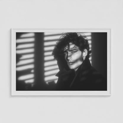 Large 60x40 black-and-white portrait print in a clean white wood frame, hanging above a contemporary credenza.