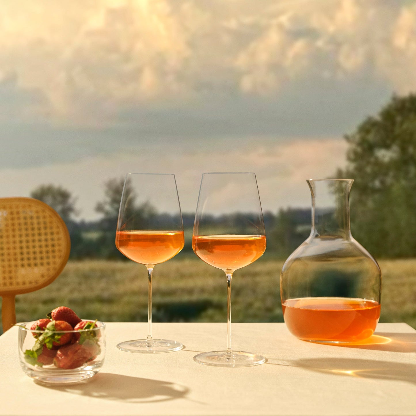 Elegant table setting featuring a decanter and the Stem Zero red wine glass.