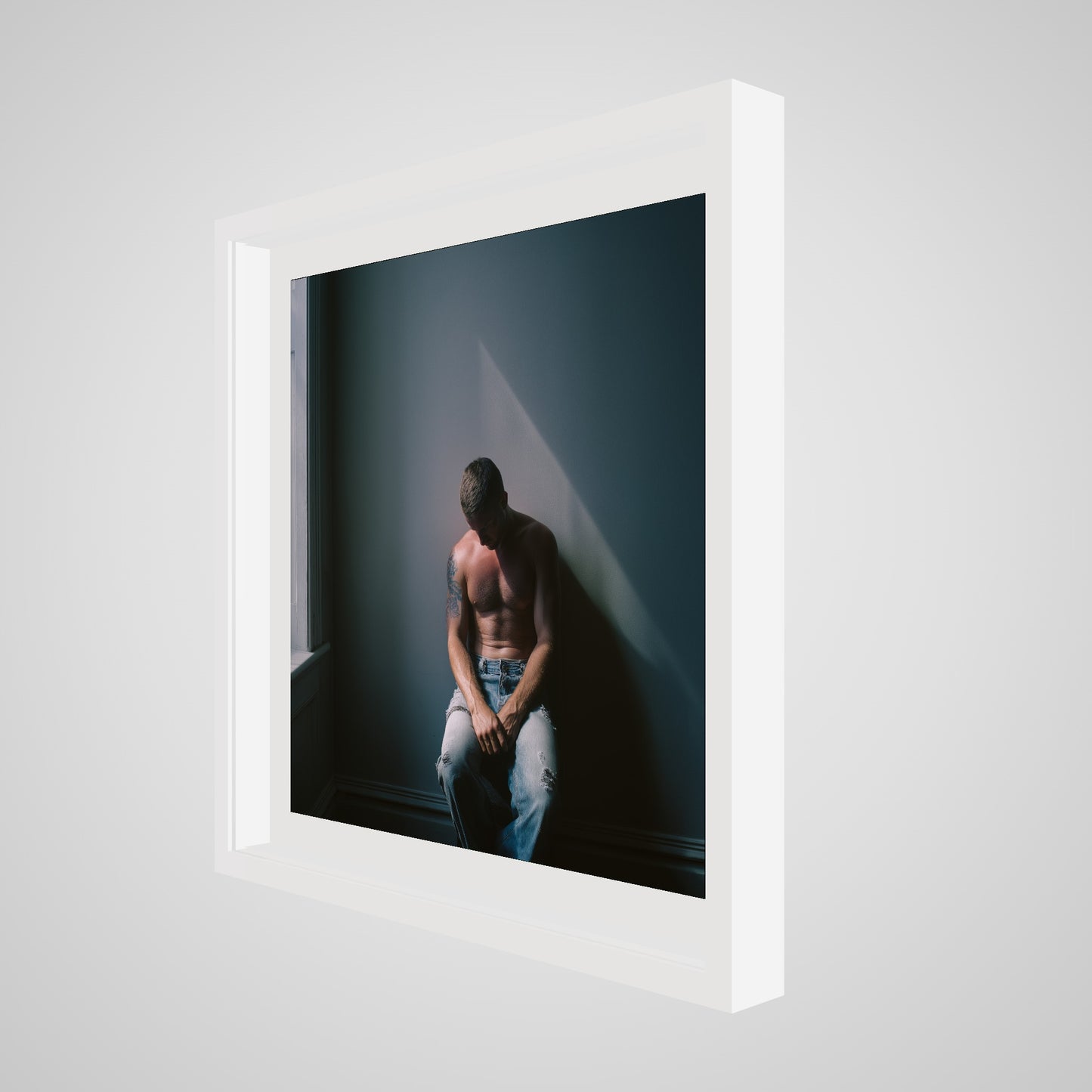 Angled view of Contemplative Male Portrait Art Print in a 24x24 deep white square spacer frame