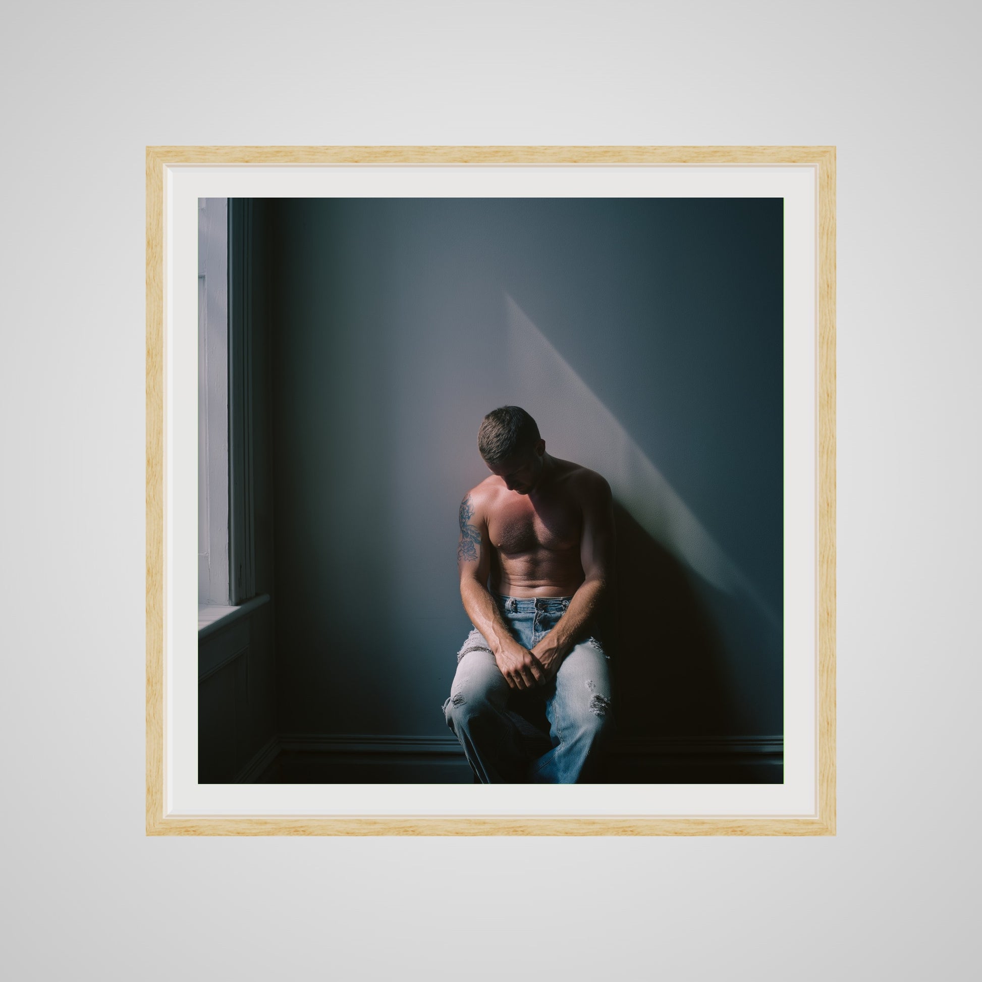 Front view of Contemplative Male Portrait Art Print in a 36x36 deep natural square spacer frame