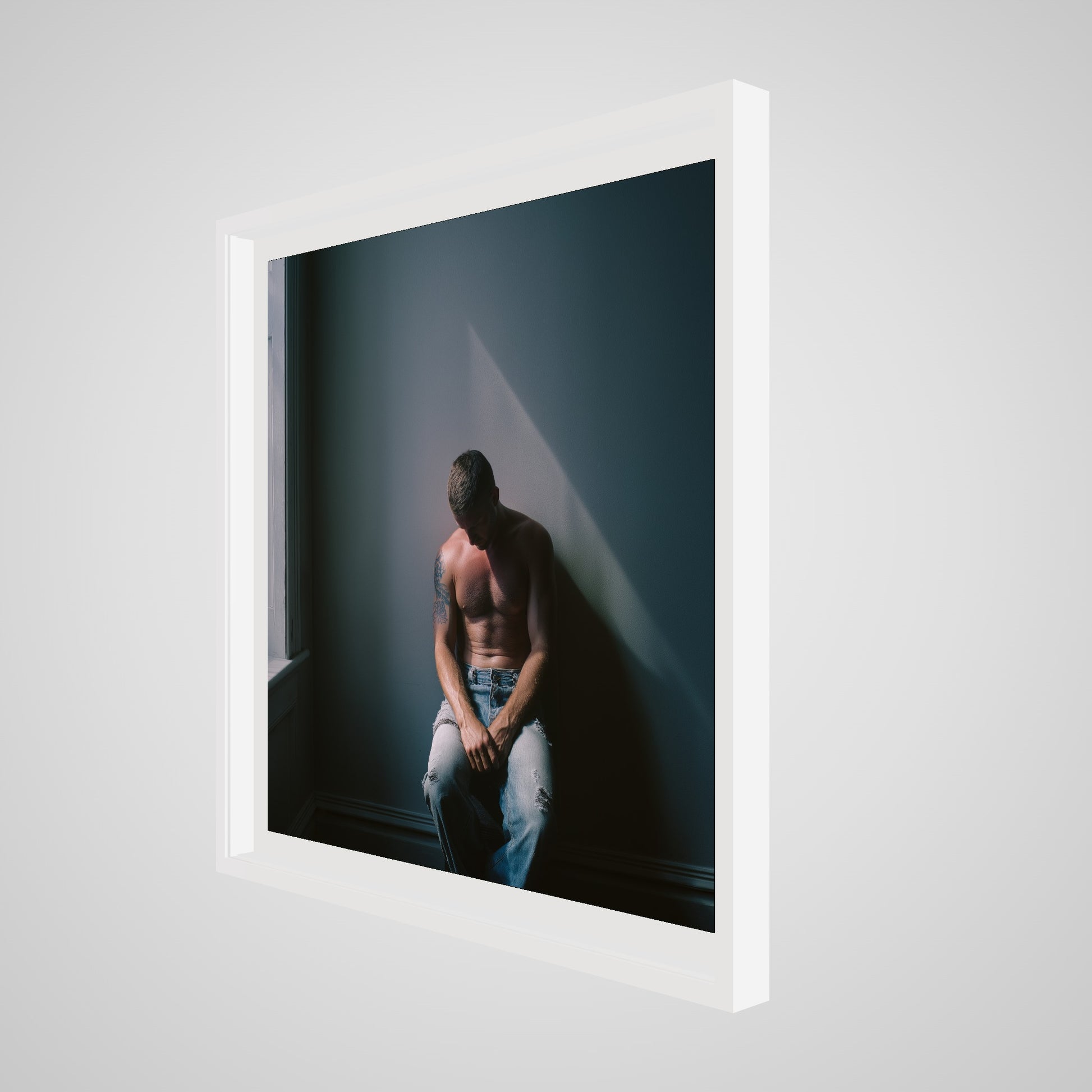 Angled view of Contemplative Male Portrait Art Print in a 36x36 deep white square spacer frame