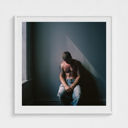 Contemplative Male Portrait Art Print in a 36x36 white square frame