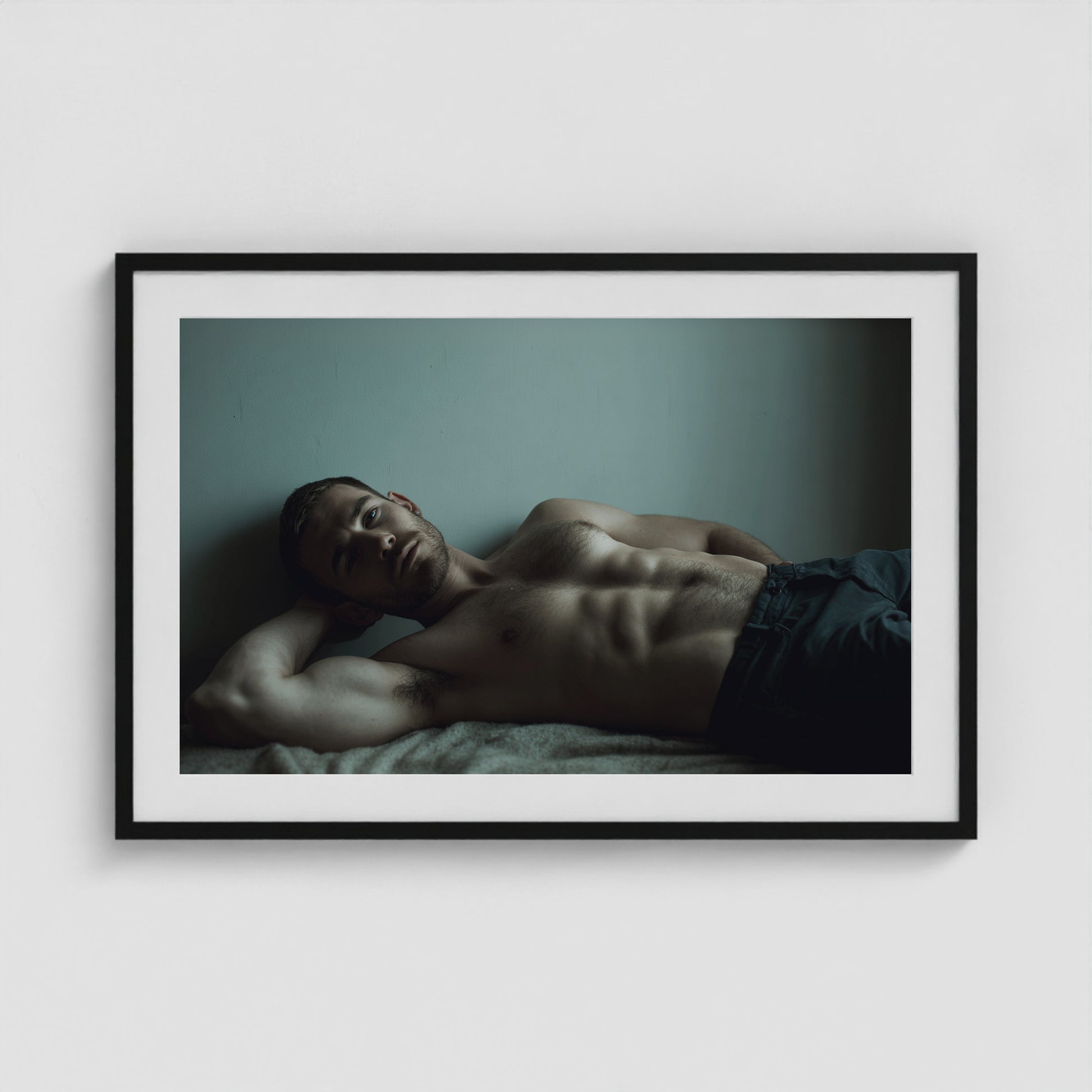 Young Man Lounging 36x24 Black Landscape Box Frame
