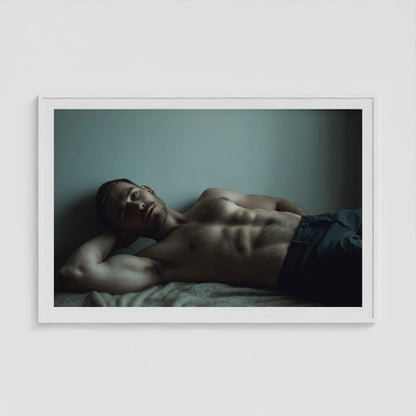 Young Man Lounging 60x40 White Landscape Box Frame