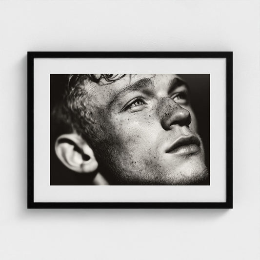Contemplative Freckled Portrait in Soft Monochrome