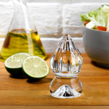 Contemporary dining setup featuring the crystal Cruet Squeezer on a styled table